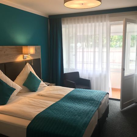Stadthotel バート・ファリングボステル エクステリア 写真