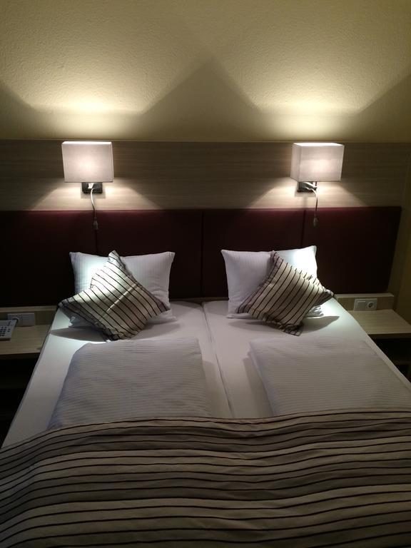 Stadthotel バート・ファリングボステル 部屋 写真