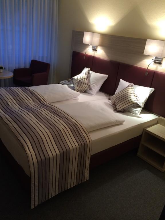 Stadthotel バート・ファリングボステル 部屋 写真